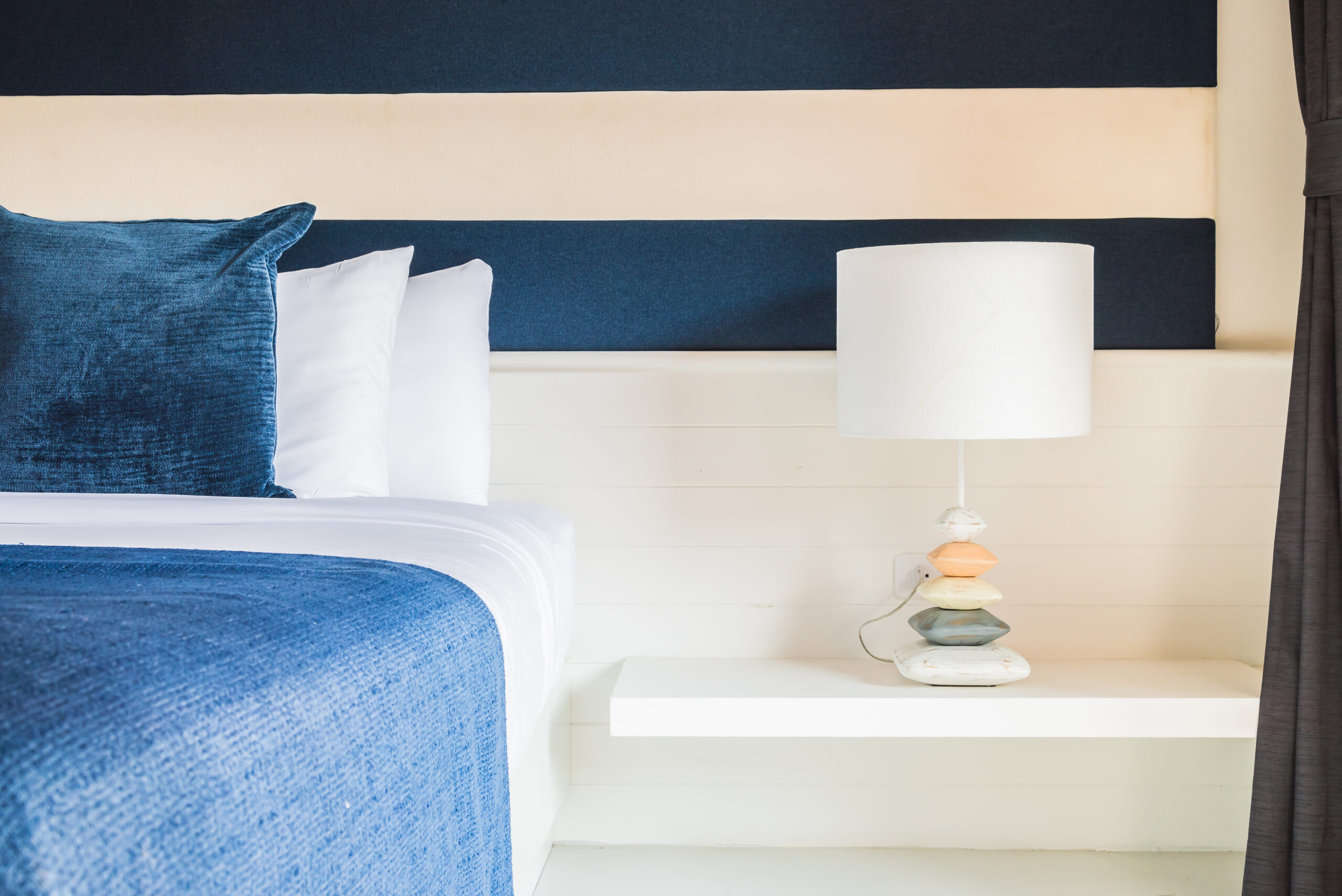 Bedroom lamp nightstand detail — coastal bedroom Riviera style