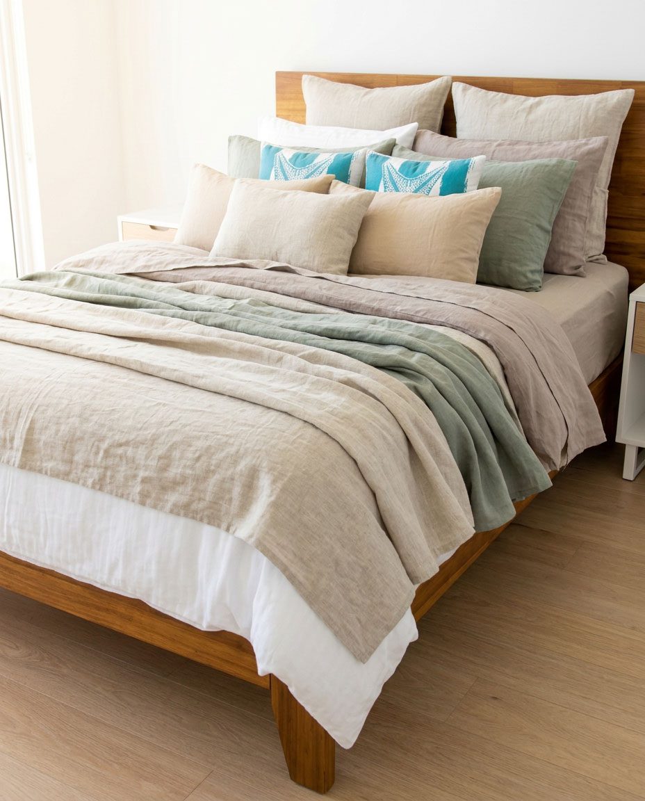 Quality bed linens detail with Jacó Beach view — Riviera Home Furniture Jacó Costa Rica