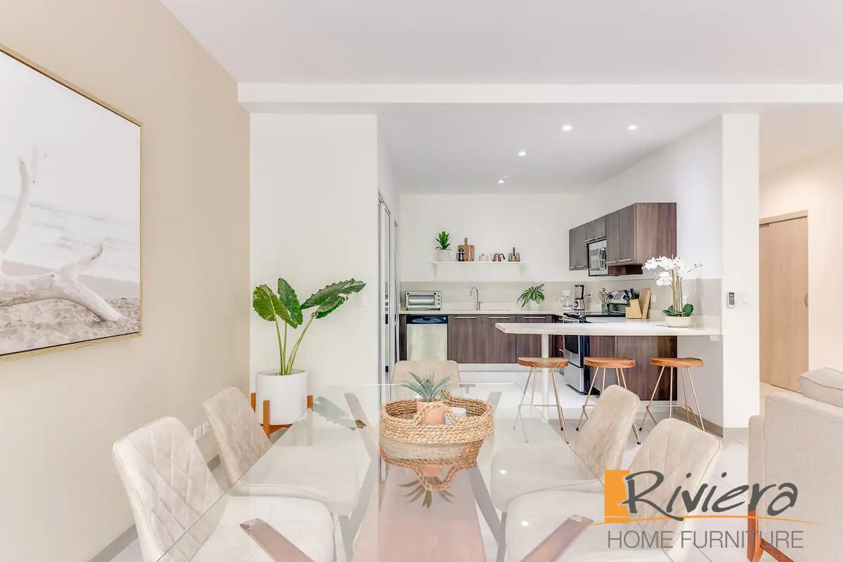 Furnished bedroom with custom bed frame, Jacó Beach condo — Riviera Home Furniture